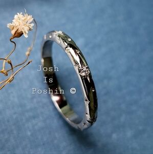 0.20CTW Moissanite Cosmic Star Ring In Sterling Silver